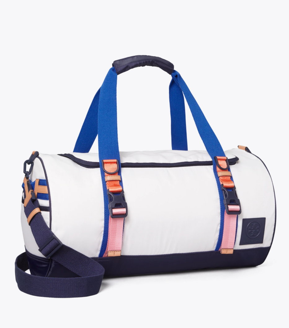 <h2>Tory Sport Ripstop Nylon Color-Block Duffle Bag</h2><br>Color-blocking, retro design, and lightweight materials make this designer duffel the perfect sporty travel companion. Some must-have features include (but are not limited to): a removable crossbody strap, shoe compartment, and its 2-in-1 convertible style. <br><br><em>Shop <strong><a href="https://www.toryburch.com/en-us/ripstop-nylon-color-block-duffle-bag/73900.html" rel="nofollow noopener" target="_blank" data-ylk="slk:Tory Burch" class="link rapid-noclick-resp">Tory Burch</a></strong></em><br><br><strong>Tory Sport</strong> Ripstop Nylon Color-Block Duffle Bag, $, available at <a href="https://go.skimresources.com/?id=30283X879131&url=https%3A%2F%2Fwww.toryburch.com%2Fen-us%2Fripstop-nylon-color-block-duffle-bag%2F73900.html" rel="nofollow noopener" target="_blank" data-ylk="slk:Tory Burch" class="link rapid-noclick-resp">Tory Burch</a>