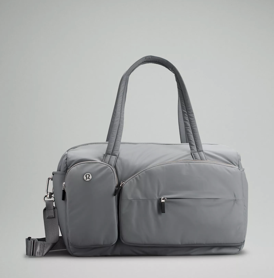 <h2>Lululemon Curved Lines Large Duffle Bag 29.5L</h2><br>Pockets, pockets, and more pockets. Lululemon's large duffel bag is here to keep every one of your essentials accessible and organized and make your travels easy as pie. <br><br><em>Shop <a href="https://shop.lululemon.com/p/bags/Curved-Lines-Duffle/_/prod10520259" rel="nofollow noopener" target="_blank" data-ylk="slk:Lululemon" class="link rapid-noclick-resp"><strong>Lululemon</strong></a></em><br><br><strong>Lululemon</strong> Curved Lines Large Duffle Bag, $, available at <a href="https://go.skimresources.com/?id=30283X879131&url=https%3A%2F%2Fshop.lululemon.com%2Fp%2Fbags%2FCurved-Lines-Duffle%2F_%2Fprod10520259" rel="nofollow noopener" target="_blank" data-ylk="slk:Lululemon" class="link rapid-noclick-resp">Lululemon</a>